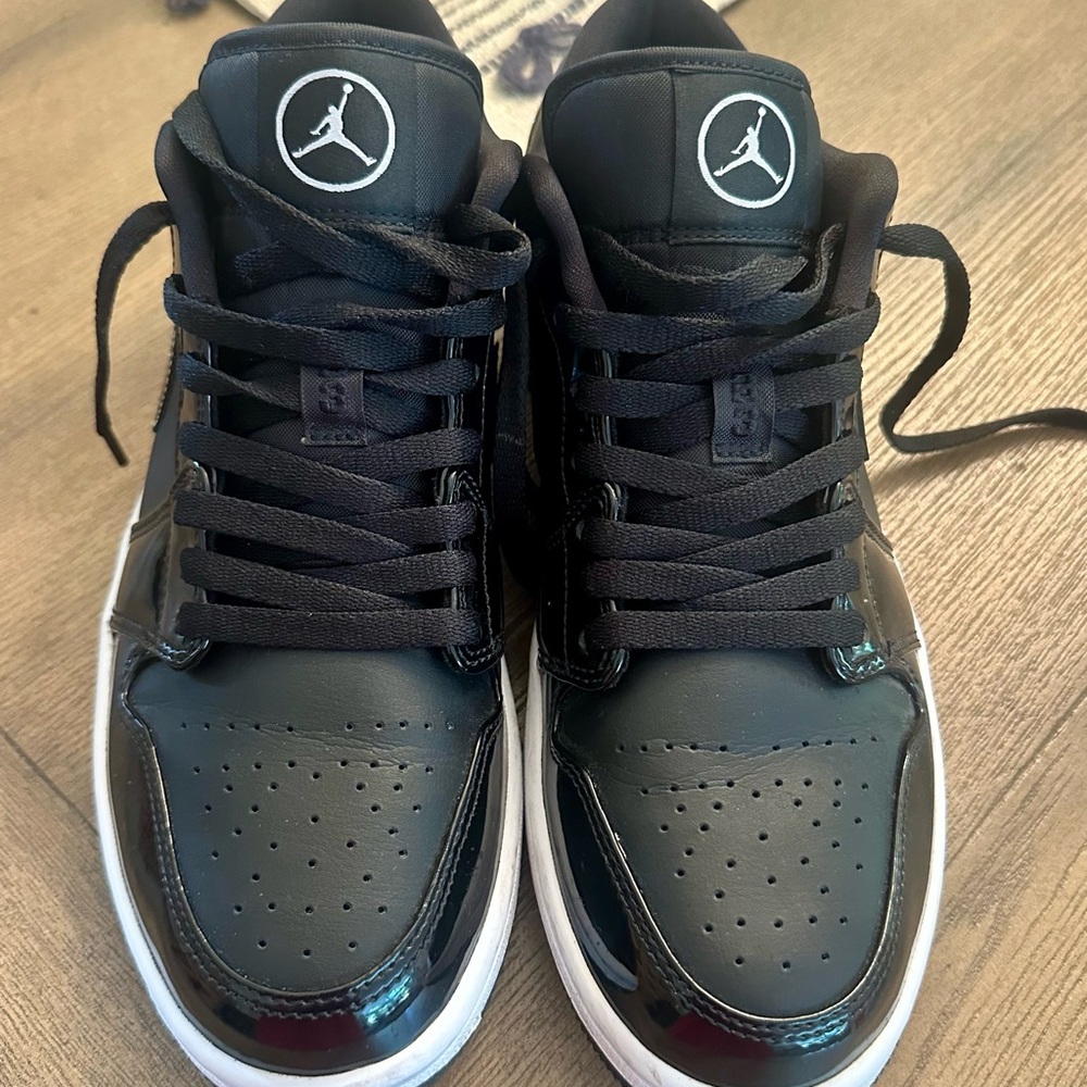 Jordan Black Sneakers with Perforated Detailing